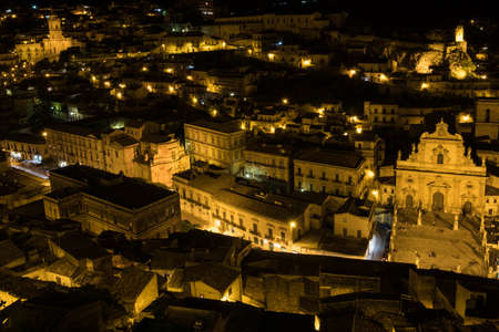 A night panorama of Modica, Sicily, with the cathedralの写真素材