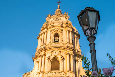 The facade of the Saint George Cathedral of Modica, Sicily, built in late-baroque styleの写真素材