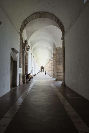 PADULA, ITALY - AUGUST 22th 2018: Tourists visit the cloister hallway of Certosa di San Lorenzo, a Cartusian abbey close to Salerno (Italy).のeditorial素材