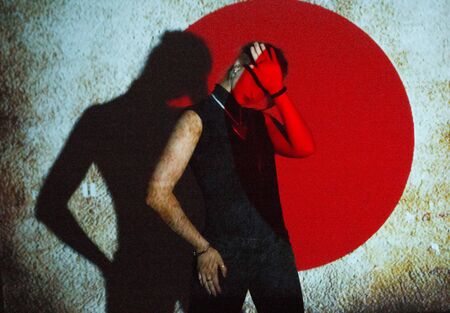 Art low key photography using projected light geometric patterns,