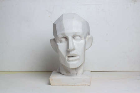 Belarus, Minsk, 16.04.2020 group classical plaster head bust against a white, old, worn wall....
