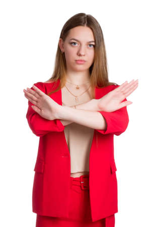 A young business woman against a white background isolated. shocked covering mouth with hands.の写真素材