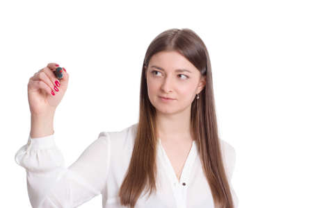 portrait of a young businesswoman in a white shirt and plaid skirt .. writes with a marker with copy spaceの写真素材