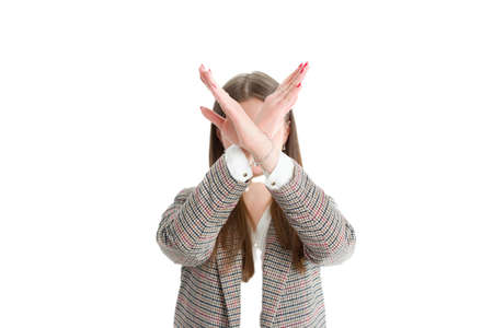 portrait of a young business woman in a plaid jacket. Isolate on white. Making a stop gesture