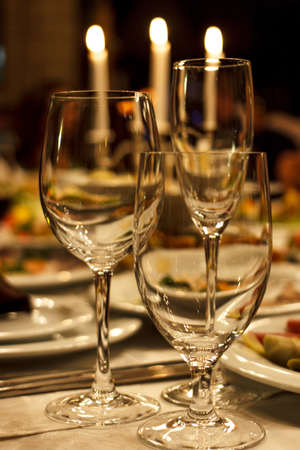 Glass on a background of candles