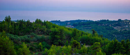 Sunset in Greece in the mountains overlooking the sea