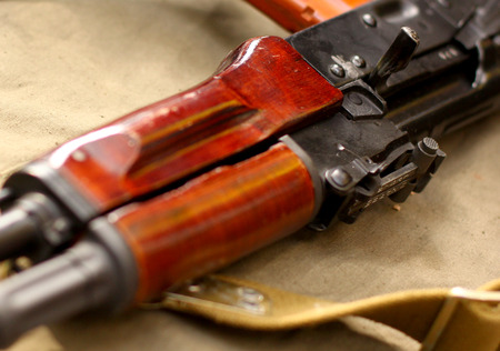 AK47 Rifle on a White on military backgroundの写真素材
