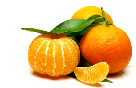 Mandarin, tangerine citrus fruit, with green leaf, isolated on white background. Pile of a fresh citrus.の写真素材