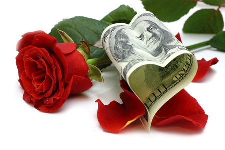 Heart of the dollar and roseの写真素材