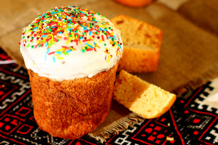 Happy Easter bread cupcakes on traditional tablecloth.の写真素材