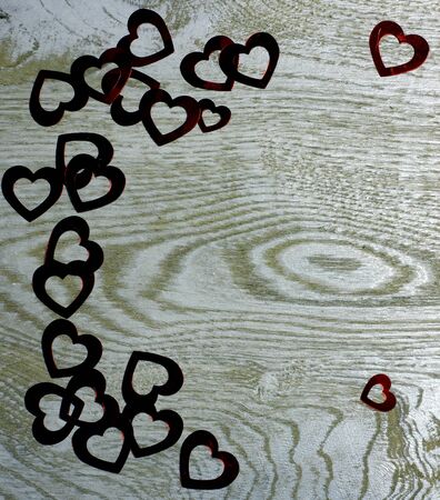 Corner frame border of Hearts on wooden background. Love card for Valentine's day. Concept with big copyspase for hand made crafts or DIY illustration.の写真素材