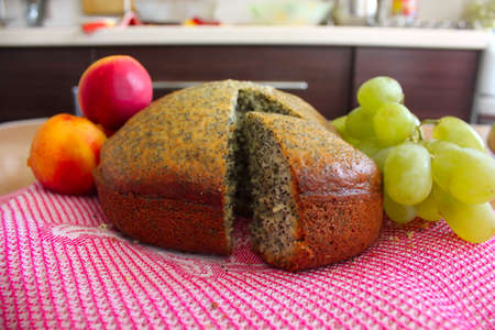 homemade pastries with poppy seeds and juicy fruitsの写真素材