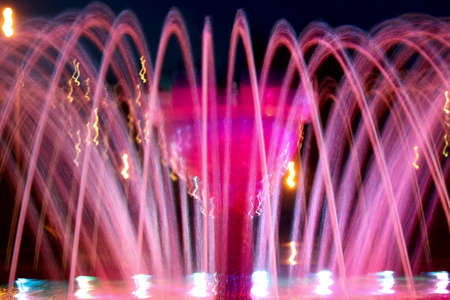 summer bright fountain in pinkの写真素材