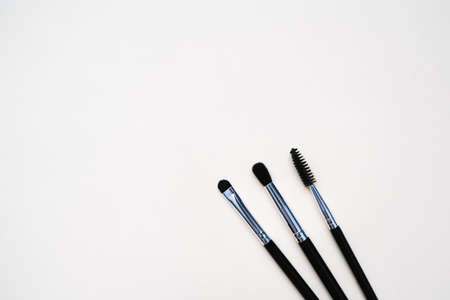 cosmetic makeup brushes for makeup artists on a light uniform backgroundの写真素材