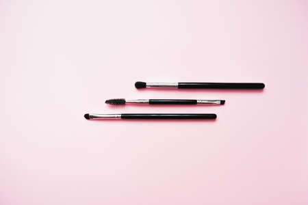 cosmetic brushes for makeup on a pink background, fashion, beautyの写真素材
