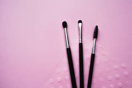 cosmetic brushes for makeup on a pink background, fashion, beautyの写真素材