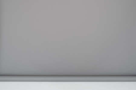 gray paper background in a rack photo studioの写真素材