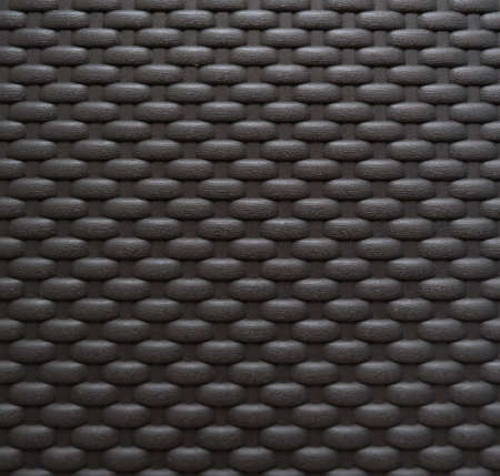 brown plastic wicker background with place for textの写真素材