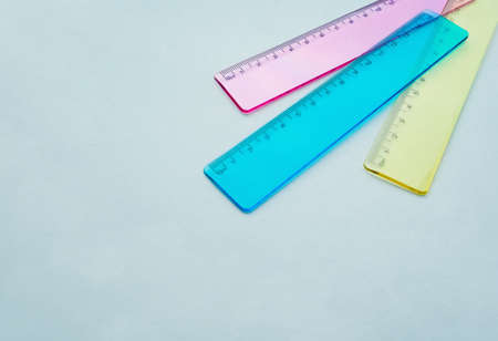 multicolored school rulers on a light backgroundの写真素材