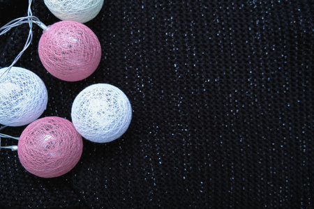 a garland of balls on a dark backgroundの写真素材