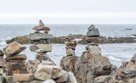 Inukshuks Standing on the Atlantic Coast, Portsmouth, NH, USAの写真素材