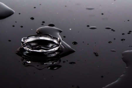 water splash with black backgroundの写真素材