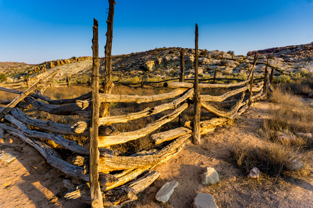 Old fence in the desert on a hot dayの写真素材