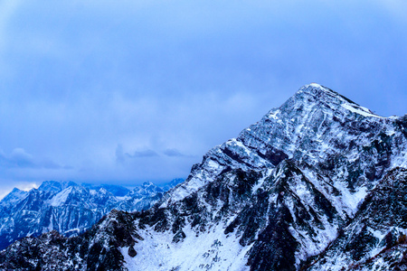 High and rugged mountain in Sochi, Russia in Winter at a ski resort.の写真素材