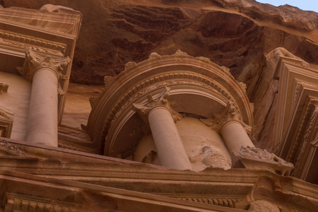 The treasury Al Khazneh carved into the rock at Petra, Jordan. Petra is one the New Seven Wonders of the Worldの写真素材