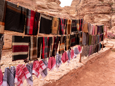 Colorful scarves for sale along a desert trail in the desert inthe Middle Eastの写真素材