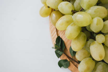 Closeup of fresh grapes on white background.の写真素材
