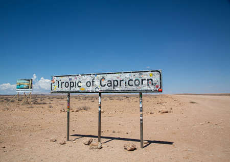Sign of the famous Tropic of Capricorn in the middle of the namib desert in Namibia during summerの写真素材