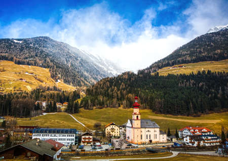 Landscape shot of the Alps between St. Johann and Sand in Taufers in Tirol, Italy in winterの写真素材