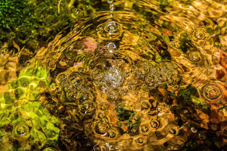 Water bubbles of a small well