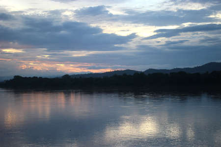 twilight sky in the evening on Mekong river.の写真素材