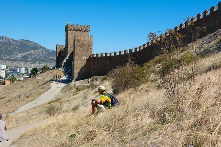 Ukraine, the Crimea, the Pike perch - on September 10 2012 - the Sudaksky fortress and the tourists walking in its territoryのeditorial素材