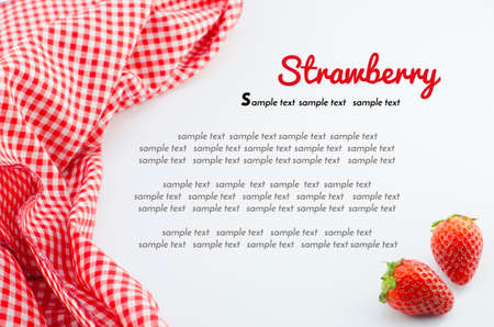 Red napkin and strawberry with sample textの写真素材