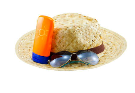 Hat with sunglasses and body lotion isolated on white backgroundの写真素材