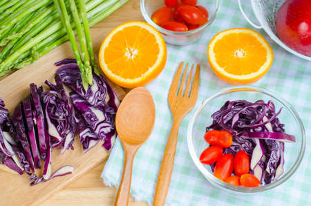 fresh vegetables and fruits on kitchen tableの写真素材