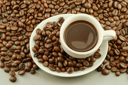 Morning coffee and coffee beans with vintage toneの写真素材