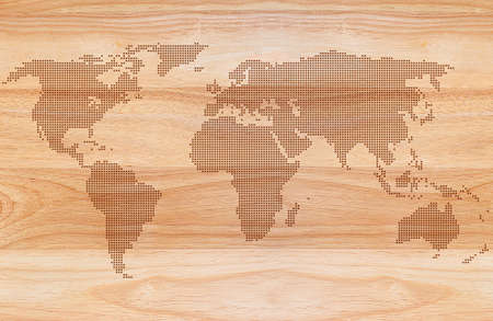 World map with points on wooden texture backgroundの写真素材