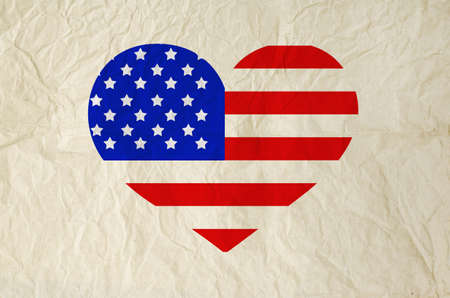 Flag of United States of America on heart shape with old vintage paper background with clipping path  Independence Dayの写真素材