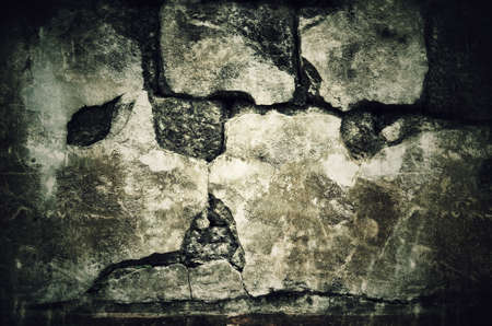 Grunge red brick wall texture background with vintage and vignette tone - Horror backgroundの写真素材