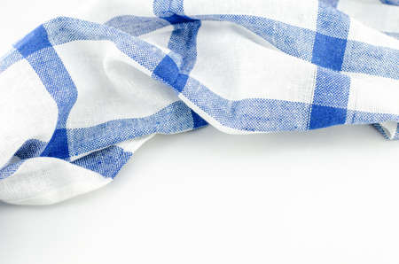 Blue napkin on white background with copy spaceの写真素材