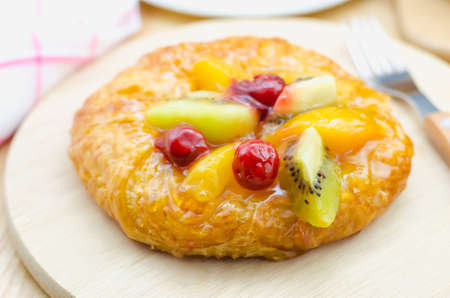Close up of Homemade Fruit Danish on wooden boardの写真素材