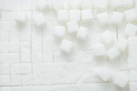Close up of white cube refined sugars texture background