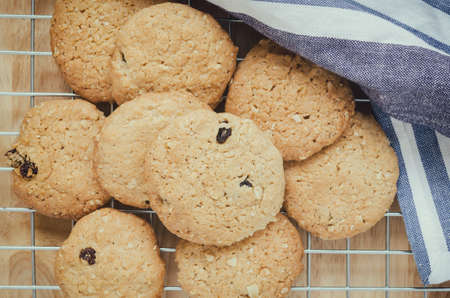 Close up of Oatmeal and raisin cookies with vintage and vignette tone - Healthy food