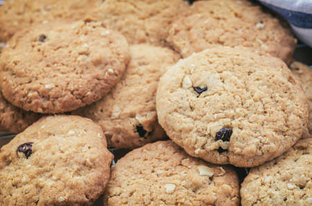 Close up of Oatmeal and raisin cookies with vintage and vignette tone - Healthy foodの写真素材