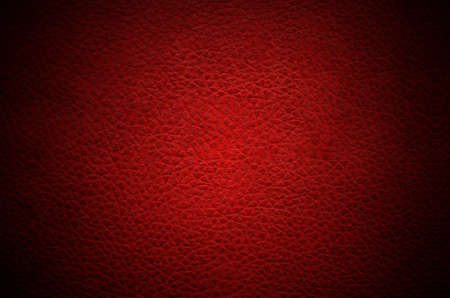 Close up of dark red leather texture background with vignette color, Red abstract texture backgroundの写真素材