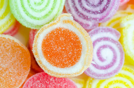 Close up of colorful candies texture background - different size and color of candyの写真素材